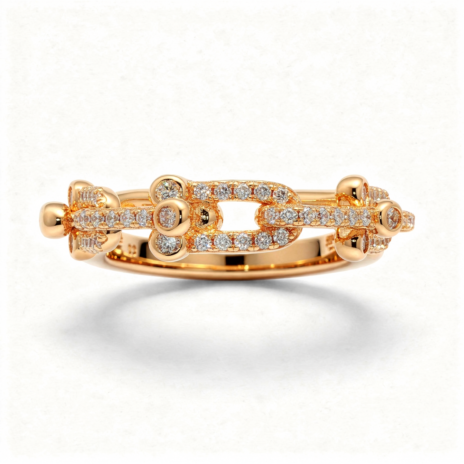 Interlock Pave Ring with White Round Stone – on Yellow Gold