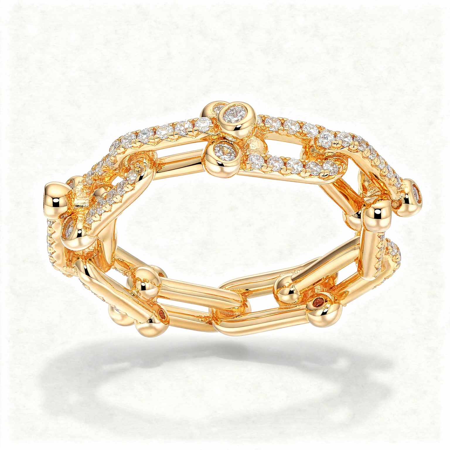 Interlock Pave Ring with White Round Stone – on Yellow Gold