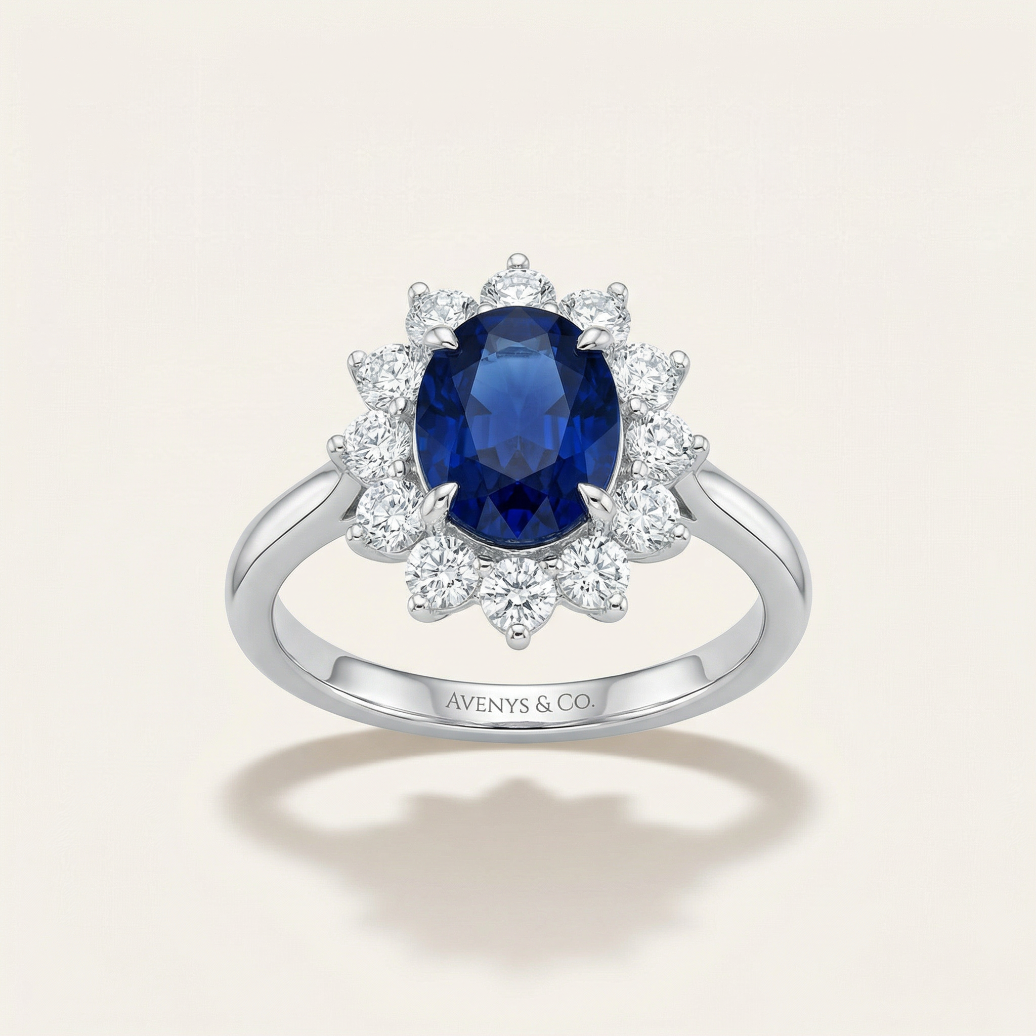 Classic Halo Ring with Blue Oval Stone – on White Gold