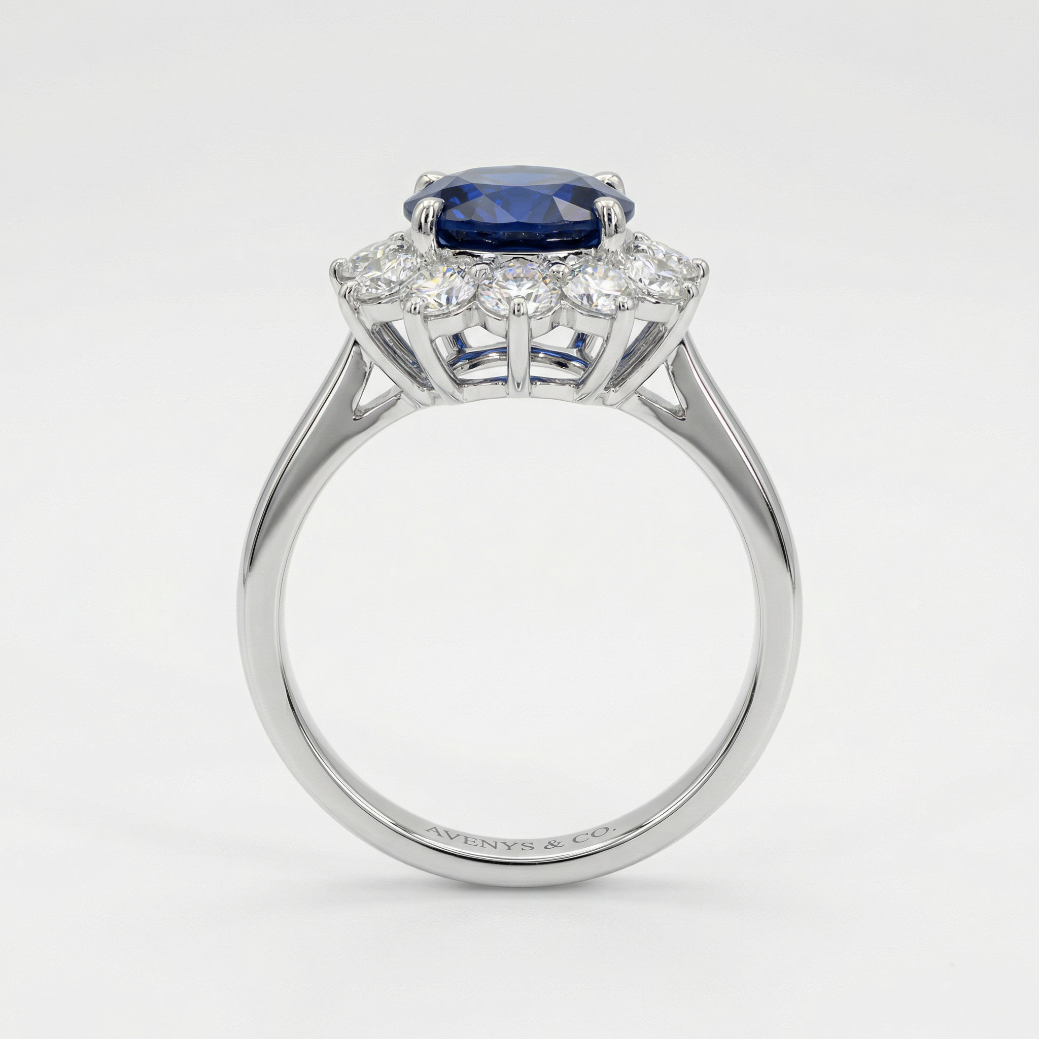 Classic Halo Ring with Blue Oval Stone – on White Gold